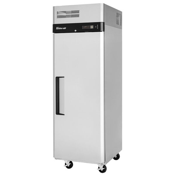 A Turbo Air M3 Series stainless steel reach-in freezer with a black handle on wheels.