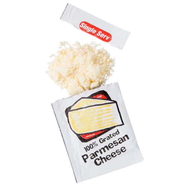 A packet of grated Parmesan cheese next to a pile of grated Parmesan cheese.