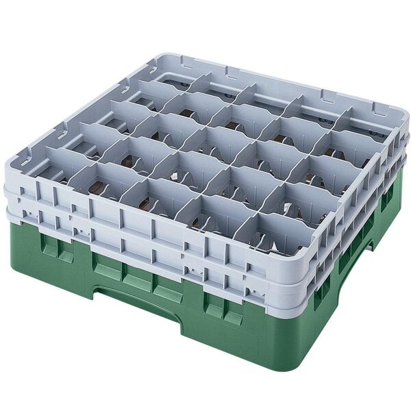 A white plastic Cambro glass rack with many Sherwood Green compartments.