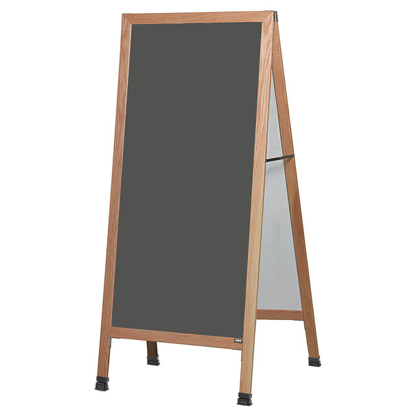 An Aarco oak A-frame sign board with a slate gray chalk board.
