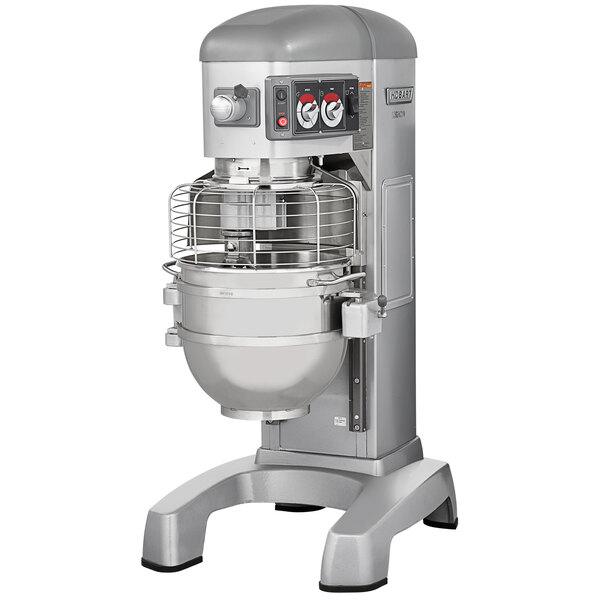 A Hobart Legacy+ commercial floor mixer with a large stainless steel bowl on a stand.