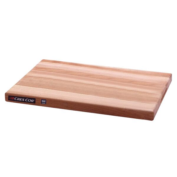 A Cres Cor maple cutting board with a black handle.