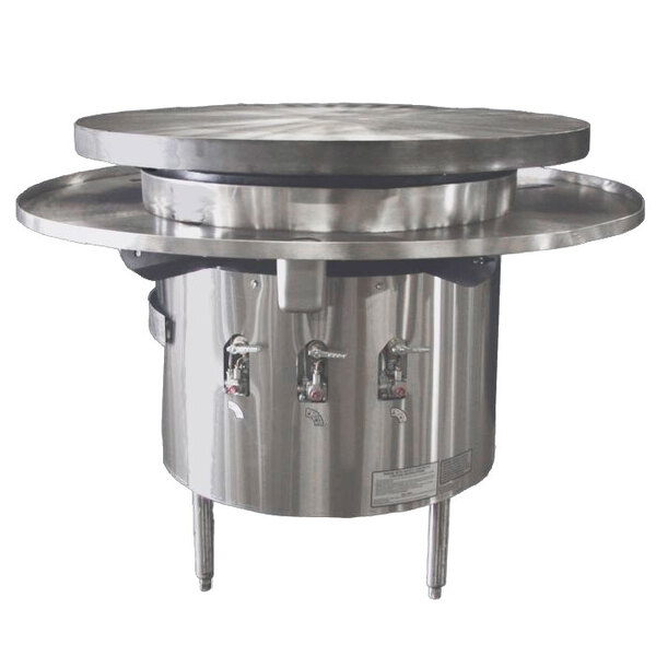 A Town natural gas Mongolian BBQ range with a metal top on a stainless steel table.