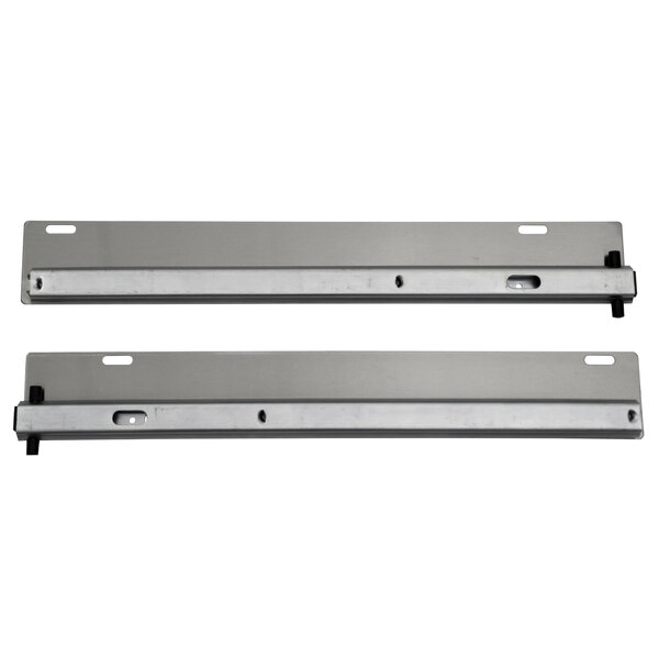 A pair of metal drawer slides.
