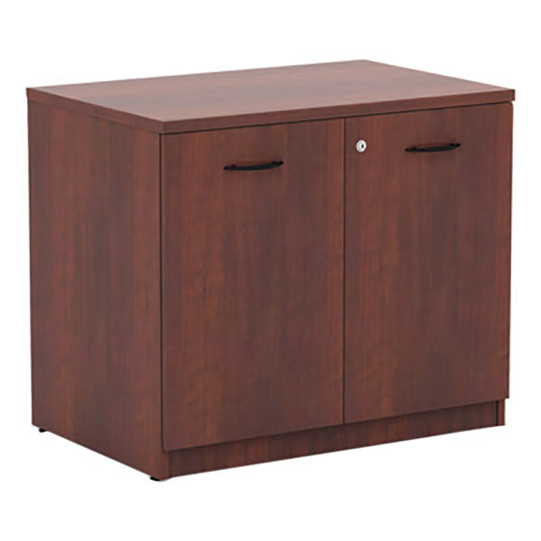 A medium cherry Alera storage cabinet with two doors and two drawers.