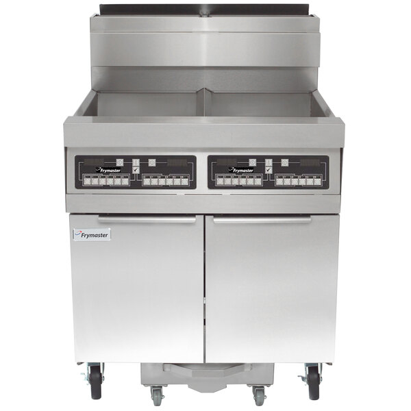 A Frymaster natural gas floor fryer system with two large pans.