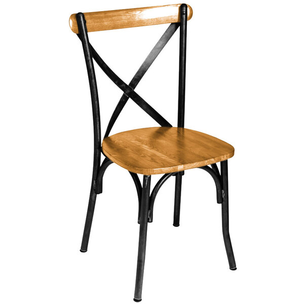 A BFM Seating Henry side chair with a natural ash wooden seat and back and a black metal frame.