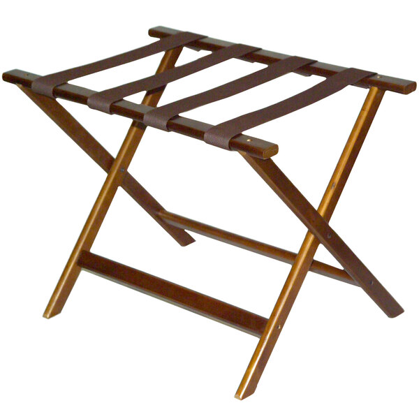 A CSL walnut wood luggage rack with brown straps.