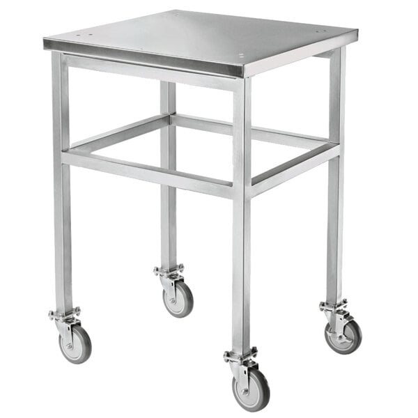 A TurboChef stainless steel table with wheels.
