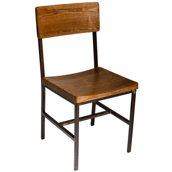 A BFM Seating Memphis wooden side chair with a metal frame.