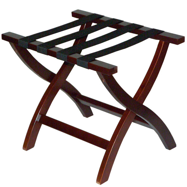 A CSL mahogany wood luggage rack with straps.