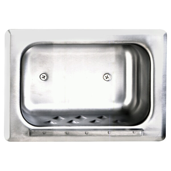 A stainless steel sink with screws holding a Bobrick recessed soap dish.