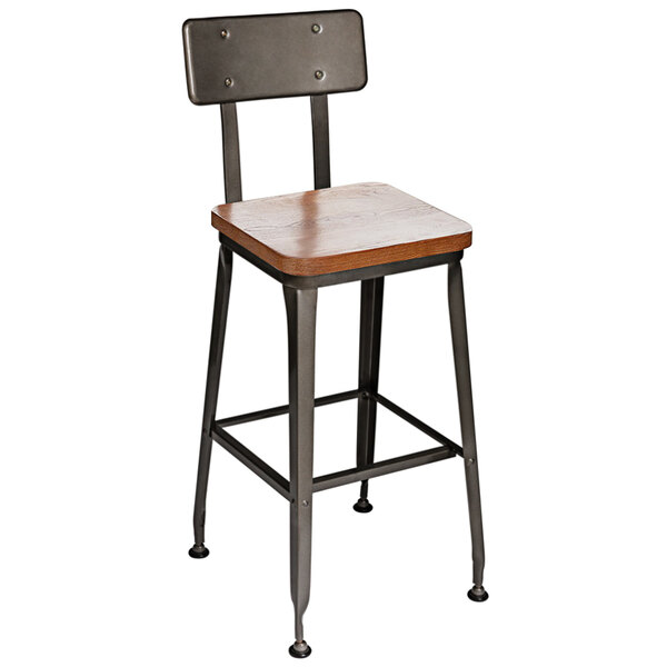 A BFM Seating metal bar height chair with a wooden seat.