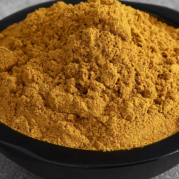 A bowl of Regal curry powder.
