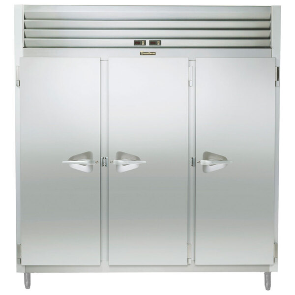 A Traulsen stainless steel narrow reach-in refrigerator with three doors.