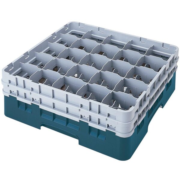 A teal plastic Cambro glass rack with 25 compartments and 5 extenders.