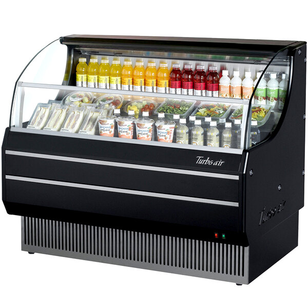 A black Turbo Air horizontal air curtain display case with drinks and beverages.