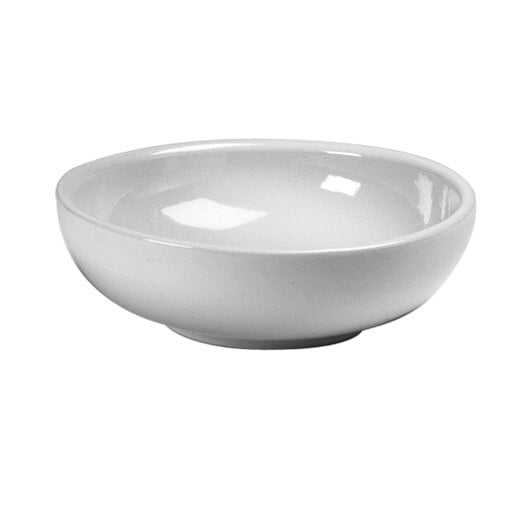 A close-up of a Hall China bright white bowl.