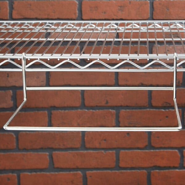 A Metro SmartWall G3 shelf with a metal rack on it.