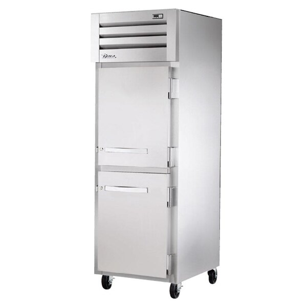 A True stainless steel holding cabinet with two drawers.