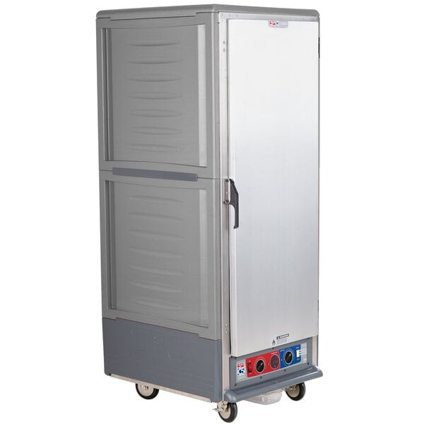 A large gray Metro C5 heated holding and proofing cabinet with wheels.