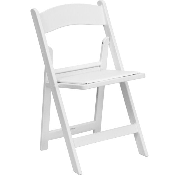 A white Flash Furniture plastic folding chair with a white padded seat.