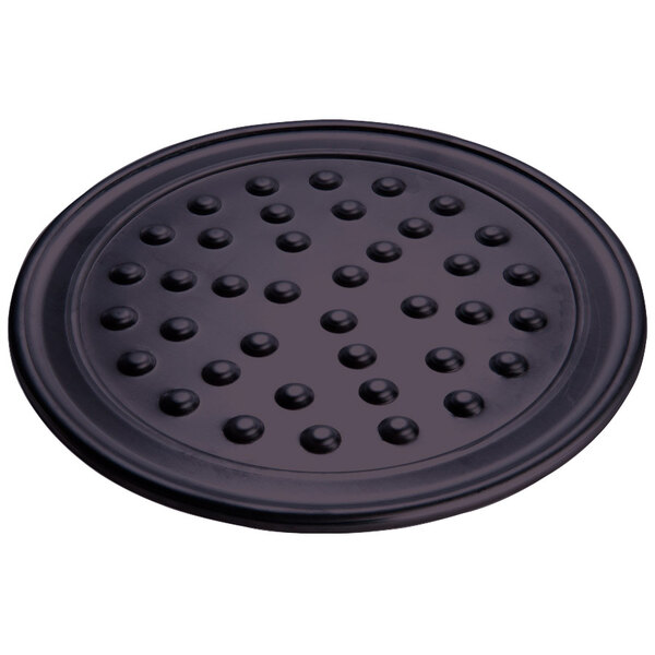 An American Metalcraft 20" hard coat anodized aluminum pizza pan with nibs on a black surface.