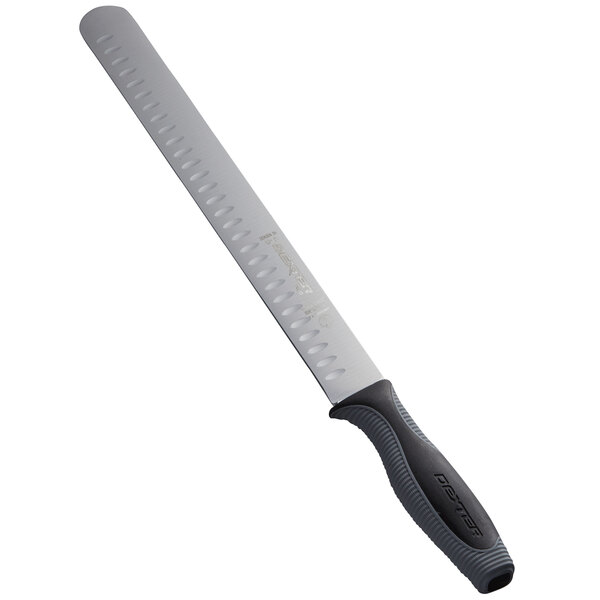 A Dexter-Russell roast slicing knife with a black handle and silver blade.