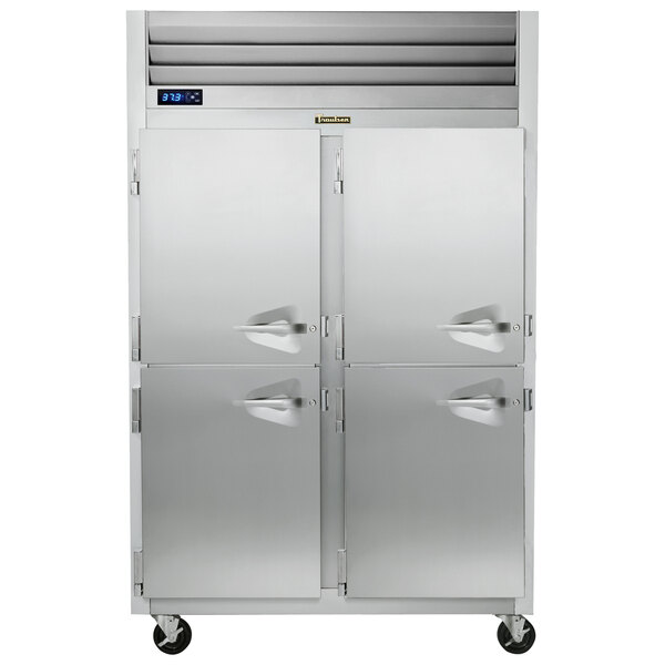 A Traulsen reach-in refrigerator with metal half doors.