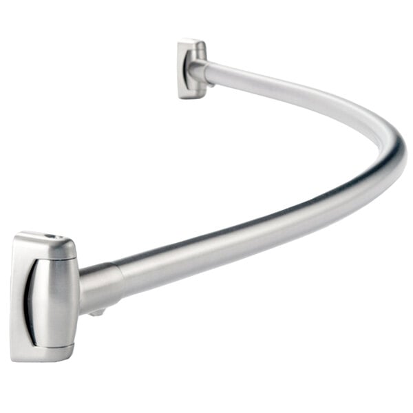 A curved metal Bobrick shower curtain rod.