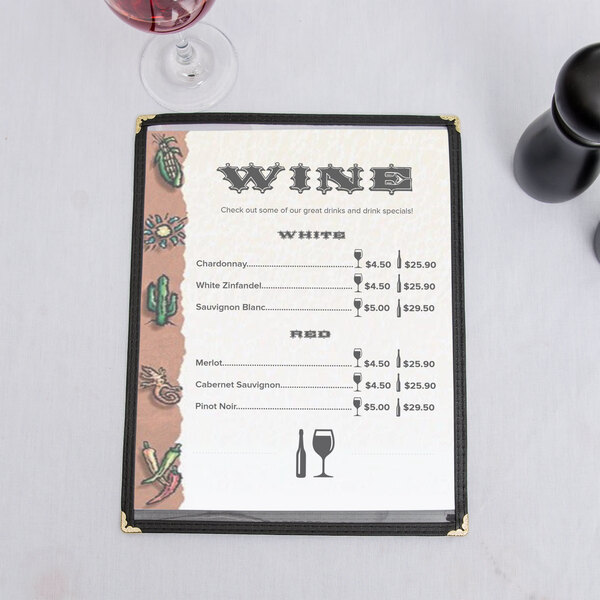 A Southwest themed menu on a table with a glass of wine.