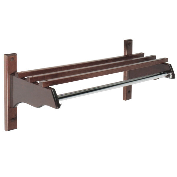 A dark oak hardwood and metal wall mount coat rack with a wooden shelf and metal hanging rod.