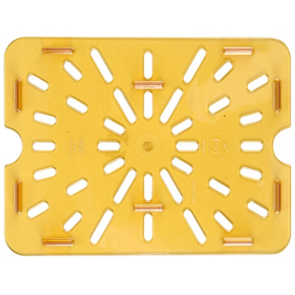 A yellow plastic drain tray with holes.
