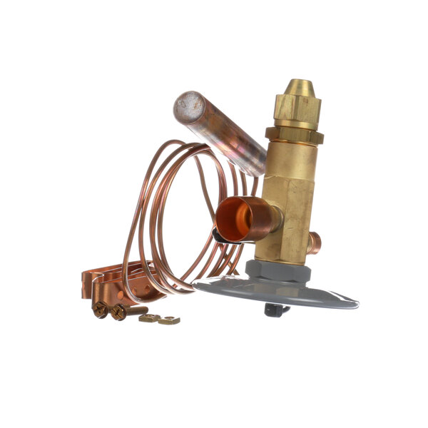 A close-up of a copper Master-Bilt expansion valve.