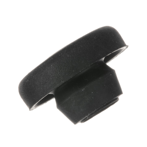 A black rubber cap with a round top for a black plastic service door.