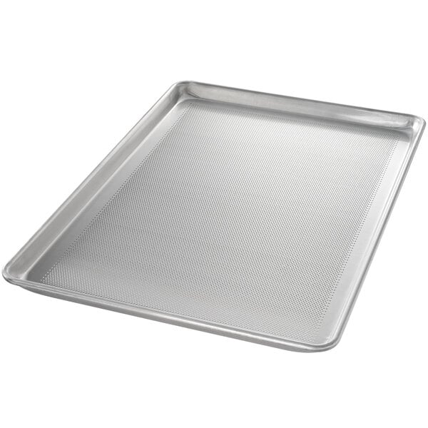 A Chicago Metallic wire-in-rim aluminum perforated sheet pan on a counter.