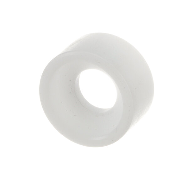 A white plastic wheel with a hole in the middle.