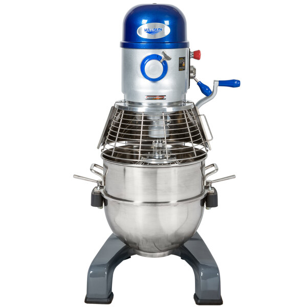 A large metal Vollrath floor mixer with a blue top.