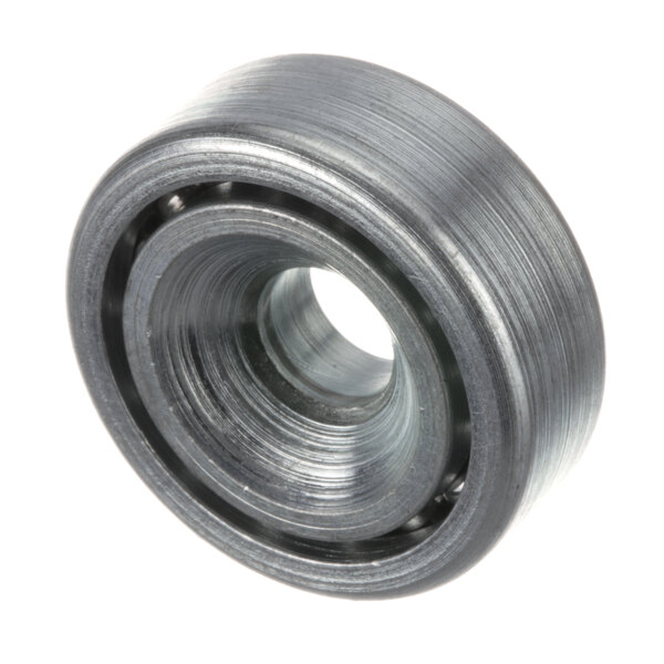 A close-up of a black and gray Montague 3 drawer roller bearing.