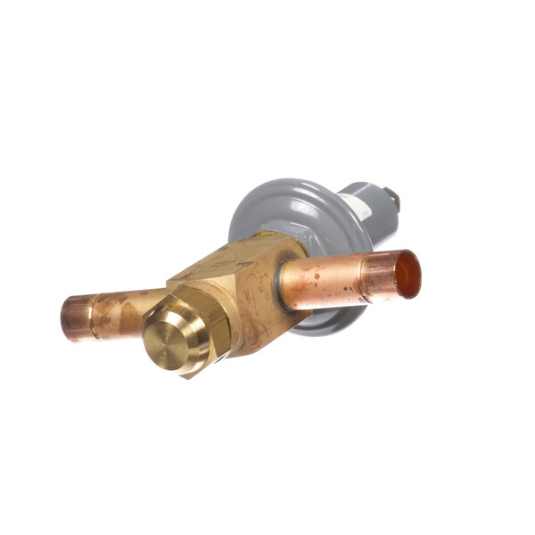 A close-up of a Master-Bilt brass and copper valve.