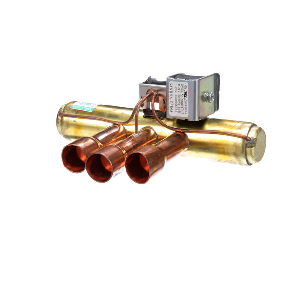 A Master-Bilt reversing valve with two copper pipes.