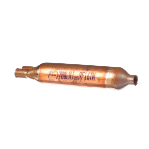 A copper tube with black text that reads "Master-Bilt 09-09864 Drier"