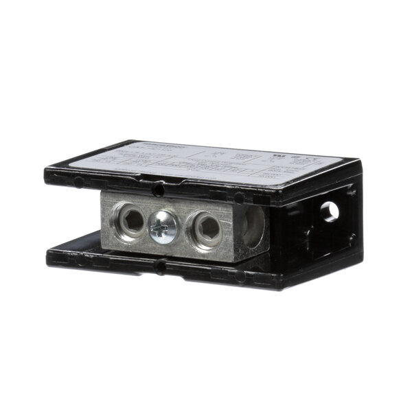 A black and silver rectangular Vulcan control block with two holes.