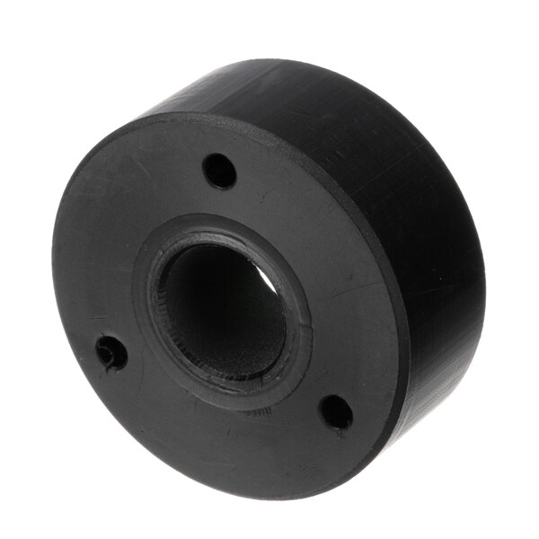 A black rubber Meiko bearing with holes.