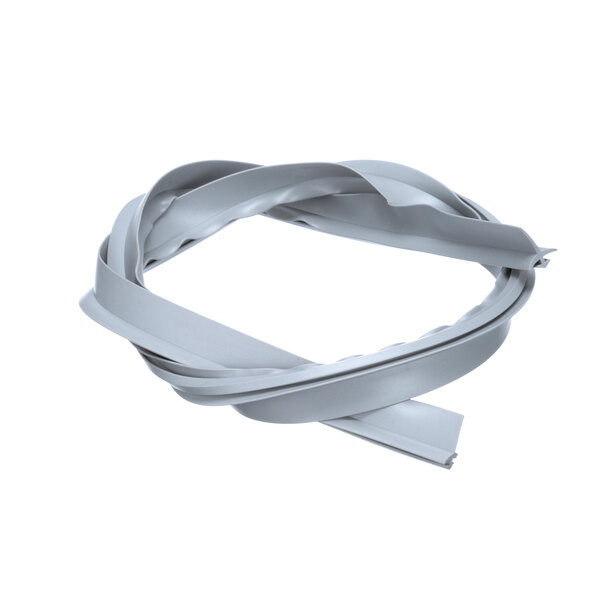 A white plastic strip with a grey plastic ring on it.