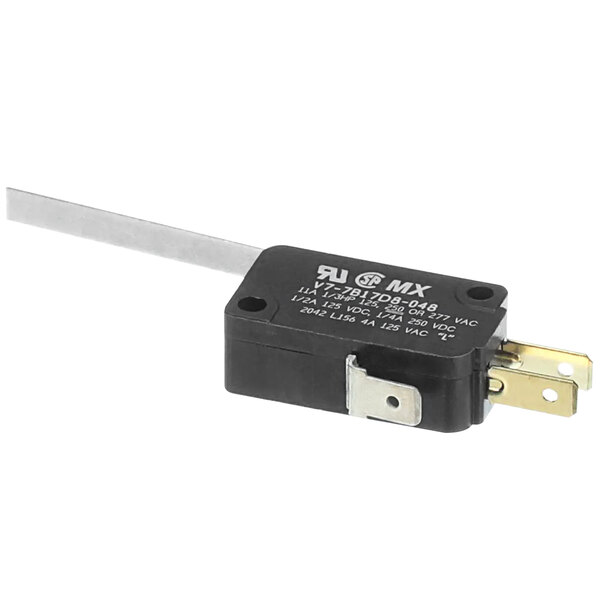 A black electronic device with white text and a long metal stick.