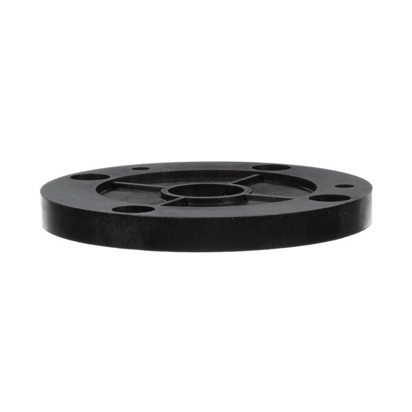 A black circular plastic spacer with a hole in the center.