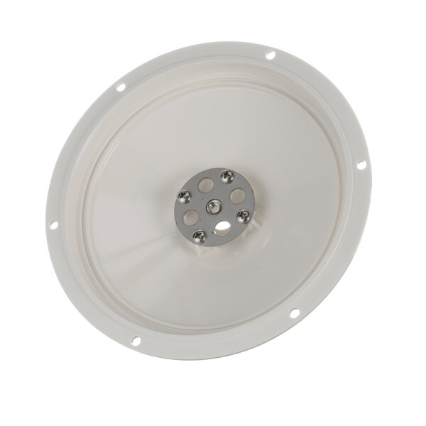 A round white Fetco spray housing with a silver metal plate with holes.
