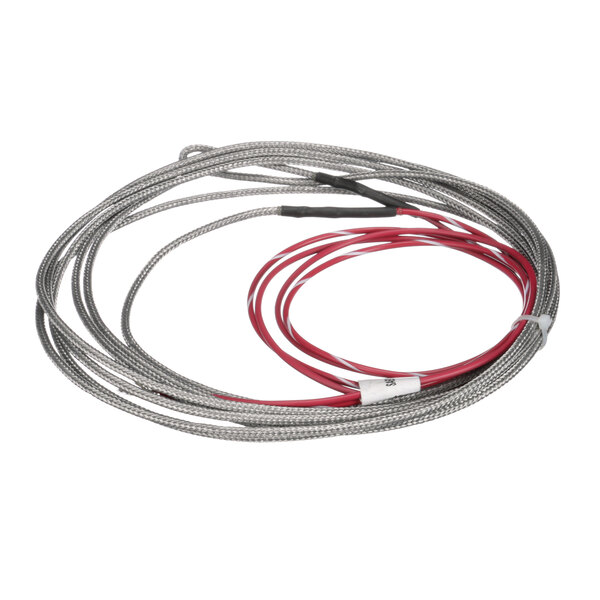 A close-up of a Continental Refrigerator door heater wire with red and white wires.