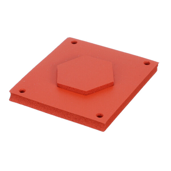 An orange plastic Ultrafryer Systems gasket with holes in a red square.